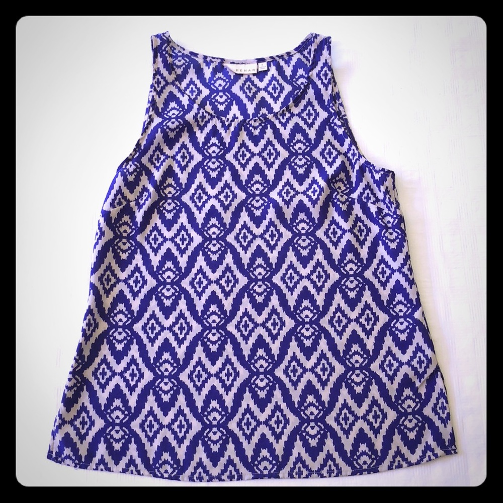 Sleeveless blouse w/ royal blue/gray pattern.